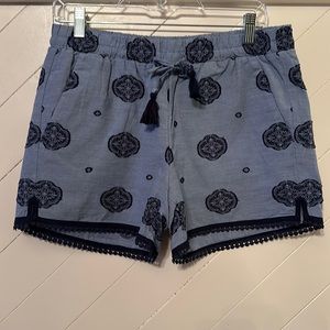 Loft navy shorts with drawstring waist and detailed hem.